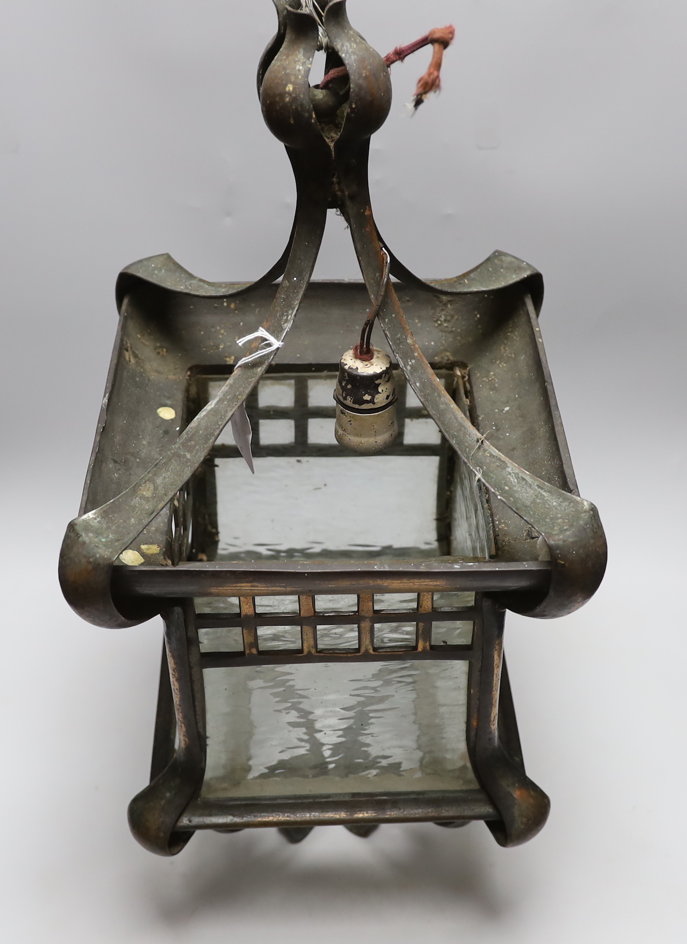 An Art Nouveau copper and glass lantern